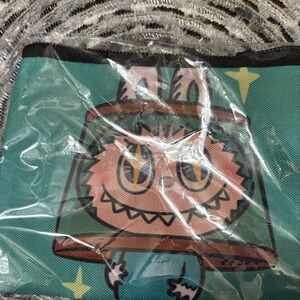 Teal Cartoon Character Pouch